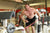 An individual in a workout session using resistance bands to target muscle groups